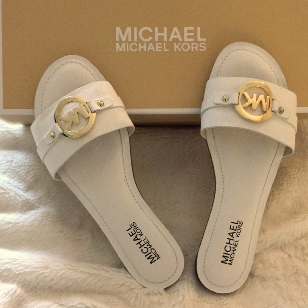 MK Molly Slides Brand New Never worn Size 6 White with gold hardware.